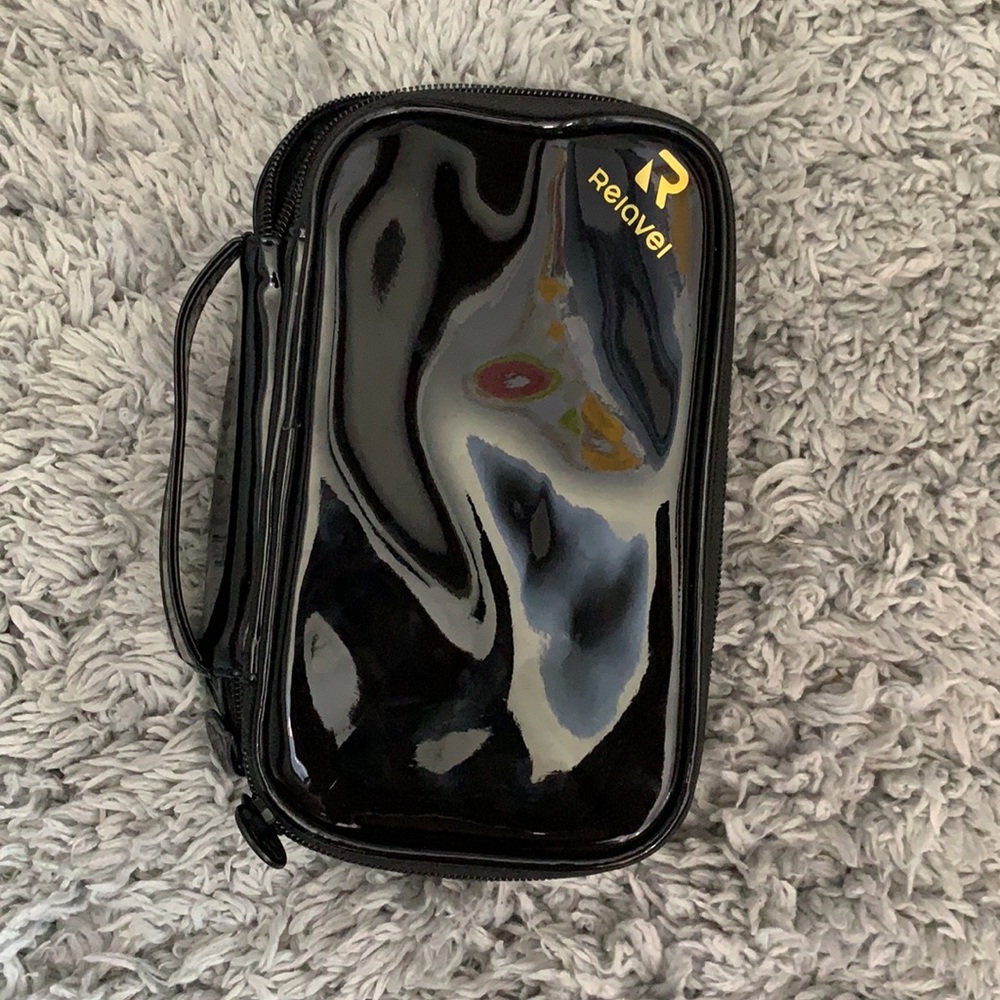 small gloss black travel makeup bag